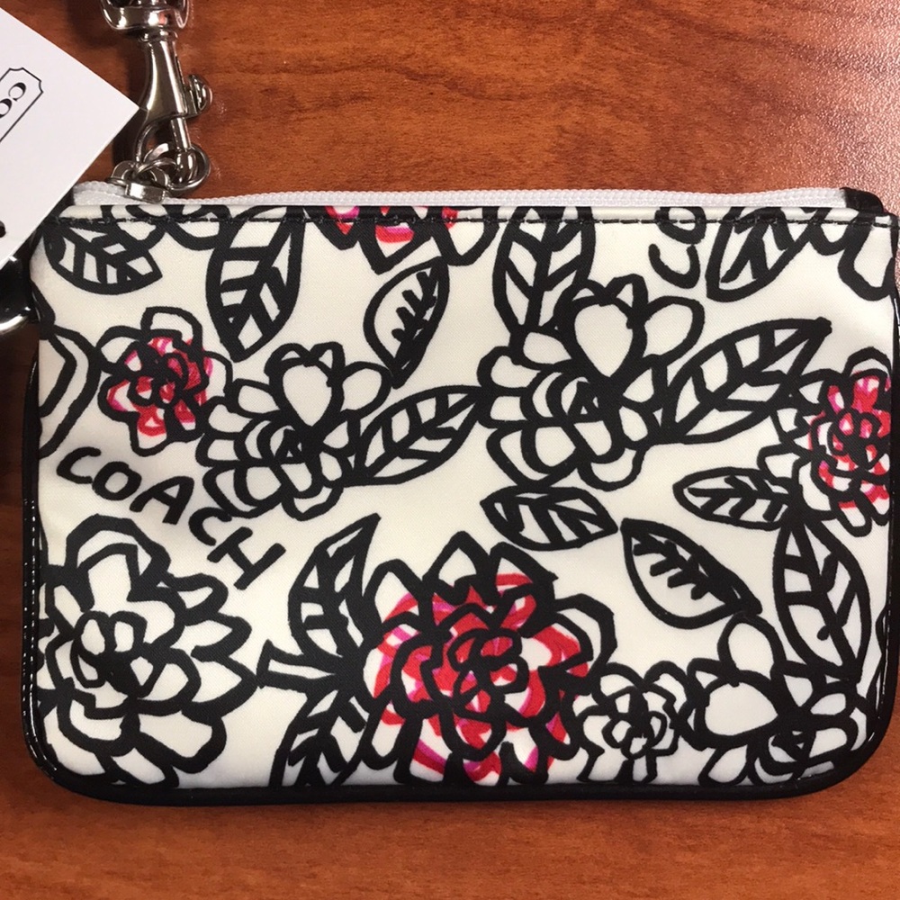 Coach signature skinny poppy wristlet